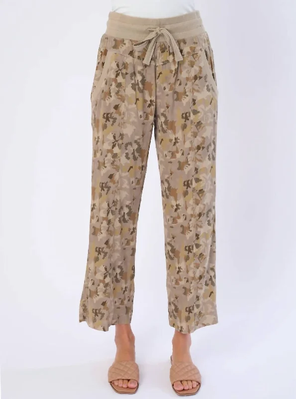 Tapered women trousers with a slimming effectNatia Pants In Abstract Camo  Floral Print