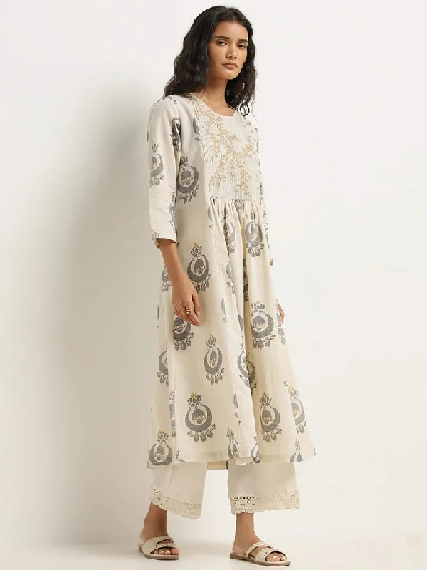 Printed Animal Print Women Shorts for a Wild and Stylish AppearanceUtsa Beige Chandbali Printed Fit-and-Flare Cotton Kurta